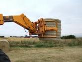 Wrapped Bale Clamp for handing wrapped silage bales.