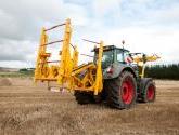 cta-Quad Bale Handling System - front and rear sections for carrying 12 round bales or 6 Heston bales at a time. Showing the hydraulic folding version.